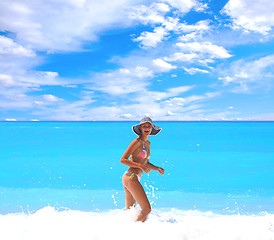 Image showing Woman enjoying the sea