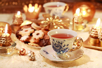 Image showing Hot tea with sweet cookies