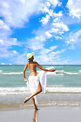 Image showing Woman enjoying the sea