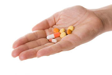 Image showing Hand & Pills