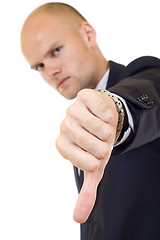 Image showing young businessman thumb down
