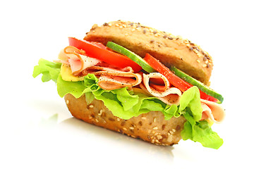 Image showing Fresh sandwich with ham and cheese and vegetables