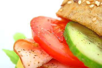 Image showing Fresh sandwich with ham and cheese and vegetables