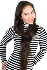 Image showing Playful pretty girl in striped blouse. Isolated