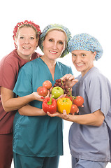 Image showing group of nurses with healthy fruits and vegetables