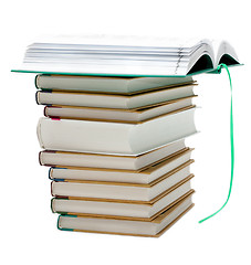 Image showing Pile of the books, openning book up