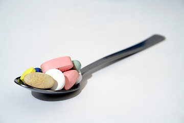 Image showing Spoon full with tablets