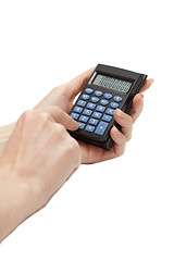 Image showing Calculator in feminine hand