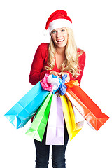 Image showing Christmas shopping santa girl