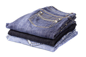 Image showing stack of blue jeans