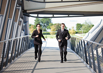 Image showing Business people in running competition