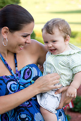 Image showing Happy Mother Holding Her Baby