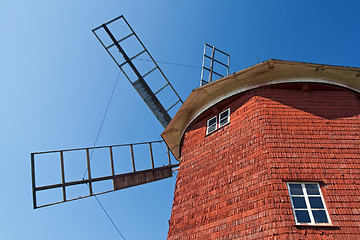 Image showing Red wooden windmill