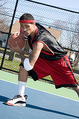 Image showing Basketball Player Dribbling