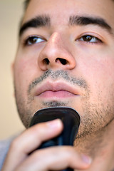 Image showing Young Man Shaving