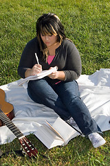 Image showing Musician Writing a Song
