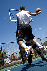 Image showing Men Playing Basketball