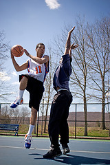 Image showing Men Playing Basketball