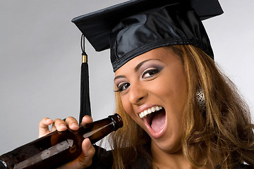 Image showing Happy Graduate Drinking