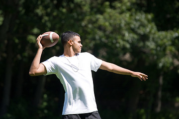 Image showing Man Throwing a Football