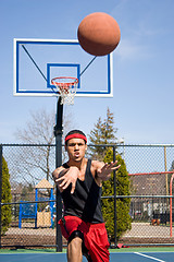 Image showing Man Passing the Basketball