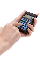 Image showing Calculator in feminine hand