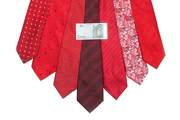 Image showing Five euro on red tie