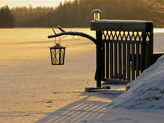 Image showing  Lantern in the afternoon on the icy lake 