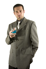 Image showing Businessman celebrating with a glass of drink