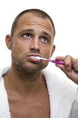 Image showing Man Brushing his Teeth