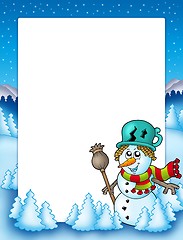 Image showing Frame with snowman and trees