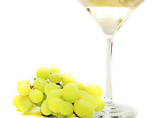 Image showing Very sweet white wine in the martini glasses isolated on white 