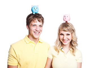 Image showing Young couple saving money