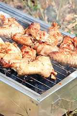 Image showing BBQ. Close up photo of cooking meet on the open fire