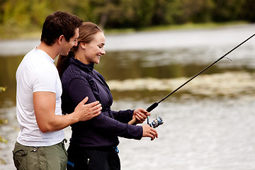 Image showing Happy Fishing Woman