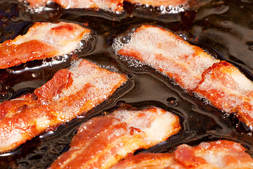 Image showing Frying Bacon