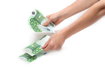 Image showing Hands considers euro