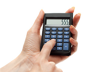 Image showing Calculator in hand 555