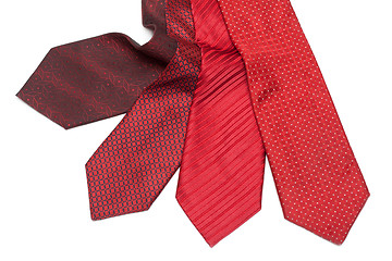 Image showing Four male ties, red and crimson