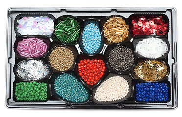 Image showing Colour beads in form