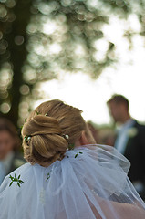 Image showing Bride facing groom unfocused