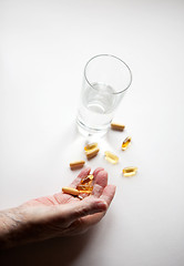 Image showing Old Hand with Pills