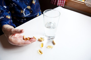 Image showing Old Hand with Pills