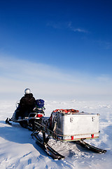 Image showing Man with Snowmobile