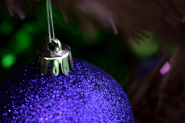 Image showing Christmas ornaments on tree.