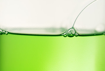 Image showing Eyes of green liquid frog