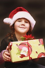 Image showing Pretty young girl in Santa hat
