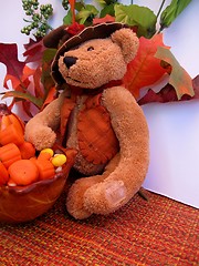 Image showing Teddy bear and candy
