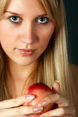 Image showing Girl with peach