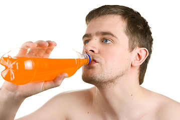 Image showing Man drinking orange juice 